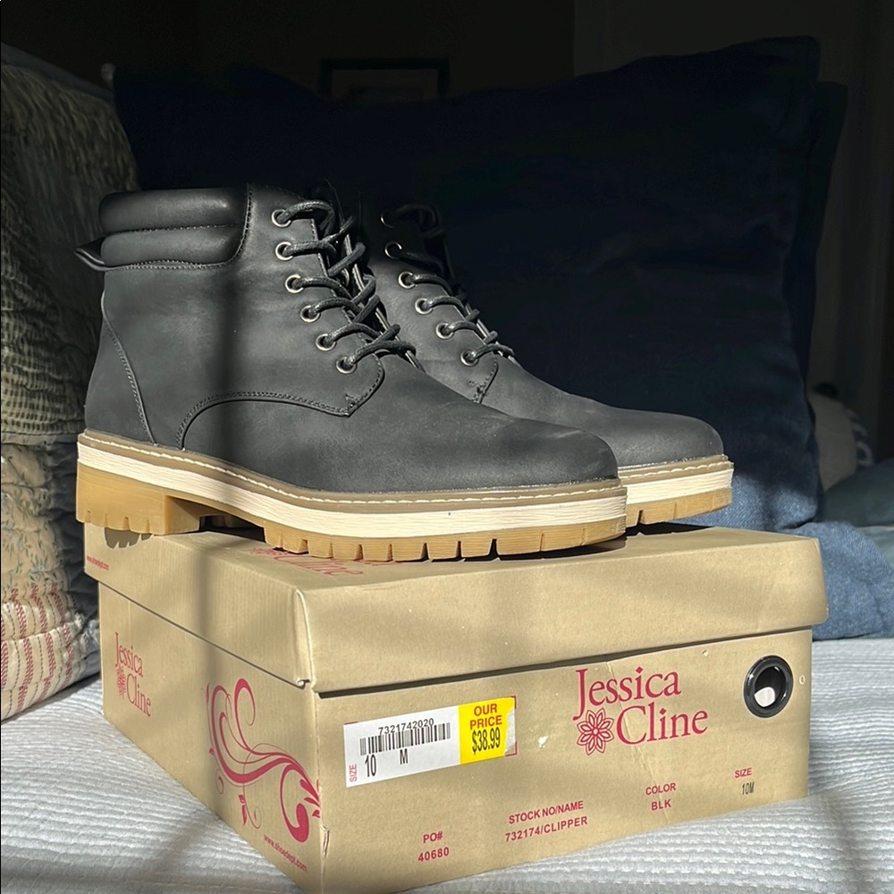 Black High-Top Boots with Lace-Up Front and Rugged Design